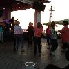 Here are some young ladies daning to the music while celebrating a birthday party.