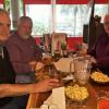 Here are R. B., Spike, and Fergie enjoying their wings and some famous Hooters curly fries. 