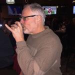 S. B. imbibing with his signature "Pinkie Up" Jack on the Rocks.