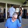 Another pic of the band
getting ready for the 
performance. The guy 
with the long hair is the
Lead Singer. Very good.