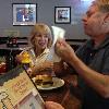 DRUMSTIR enjoying one of 
Ray's burgers. They are famous for those. But he said: "It was OK!"