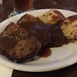 Now Billy Bob didn't care
about any stinkin' calories.
He ordered the Big One. Meat
Loaf dinner with generous
pieces of the meat, and mashed potatoes with ...GRAVY. Of course he did 
start off with a salad.  