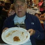 Jerry said that he didn't eat the
whole thing, and was holding
his plate up to the camera to
prove it. 
Come on Jerry, there is only one bite left, and I bet that was gone after this picture was taken! 