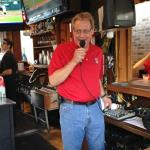 And here is TK again using the bar PA to advise the crowd
that they are going to hold a
putting contest for free tickets
to the Firestone WGC golf 
tournament.