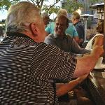 This is the back of SPIKE, being the gentleman that he is,
putting the cream in GAYLE'S
coffee.
(No pun intended)