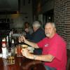 Here we have the Geezers lined up at the bar. There's SPIKE in the red shirt with his "brick" size burger, and his glass of brew with the added ingredient of "tomato juice". Says it keeps him from getting headaches. OK!