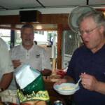 Here is another pic of the B-Day Boy with Dougie who is chowing down on some food.