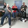 Here we have the pieced
togehter Phantom Band.
Seated in front is Big Daddy
Dan Miinier being vocal. 
Left to right behind him is 
Chuck Lyons on Keybaord
Bass, and Drums.
Next to him is Joe "Buzzy
Holly on guitar.
And then there is none other than Jack "Flash" Bishop on the lead guitar, and vocals 