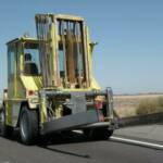 THIS SHOT AND THE NEXT WERE UNBELIEVABLE.  WE WERE GOING 80 MPH AND THIS FORK LIFT WAS KEEPING UP WITH THE TRAFFIC. 