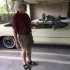 Here is S. B. with Party JoeBo stopping to admire this vintage Cadillac. on our way to the airport. He had to go into the carry-on  at the airprot.